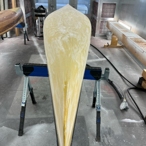 Buff and waxing of a Kevlar canoe.