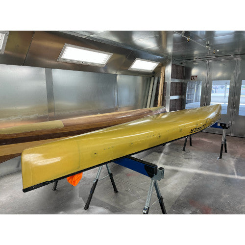 Composite Kevlar and wooden canoe bottom restoration.